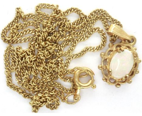 9ct gold opal set pendant on a fine gold chain, chain L: 40 cm, 2.8g. P&amp;P Group 1 (£14+VAT for the first lot and £1+VAT f
