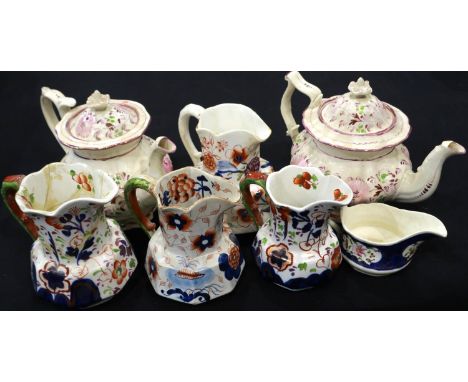 Two Sunderland lustre teapots, each H: 15 cm, with a selection of early English ceramic jugs, some damages and repairs throug