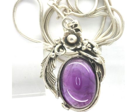 925 silver pendant necklace set with an amethyst cabochon, chain L: 54cm, 2.0g. P&amp;P Group 1 (£14+VAT for the first lot an