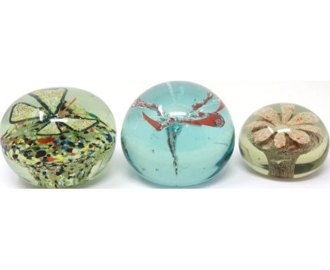 Three 19th century coloured glass paperweights. P&amp;P Group 3 (£25+VAT for the first lot and £5+VAT for subsequent lots) 