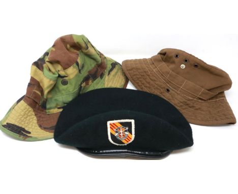 Two American Vietnam war period boonie hats and a Special Forces badged beret (3). P&amp;P Group 2 (£18+VAT for the first lot