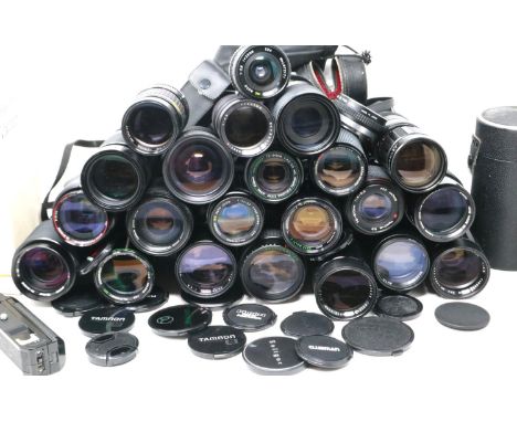 A large selection of lenses, including Canon, Vivitar, Tamron and others. P&amp;P Group 2 (£18+VAT for the first lot and £3+V