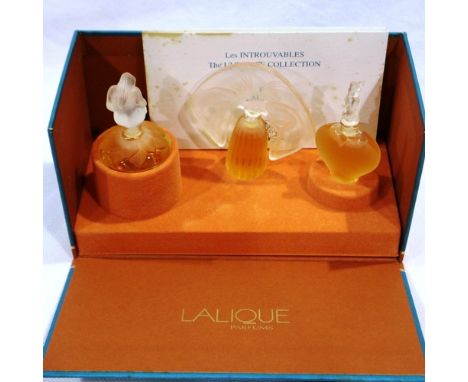 Boxed Lalique perfume set, Les Introuvables The Ultimate Collection, largest H: 70 mm. P&amp;P Group 2 (£18+VAT for the first