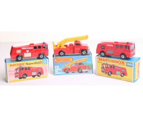 Two Matchbox Superfast 35c Merryweather Marquis Fire Engines, red body, wide superfast wheels, red, wide superfast wheels, cr