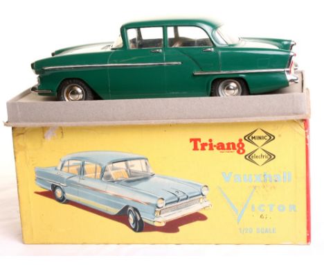 Triang Minic Vauxhall Victor, 1/20 scale ,dark green plastic body, tartan pattern tin interior, plated parts, in near mint co