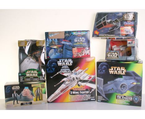Star Wars Electronic X-Wing Fighter circa 1995 in the original box with interior packaging. Green boxed type Darth Vader’s Ti