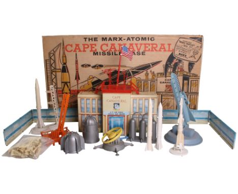 Marx Toys Atomic Cape Canaveral Missile Base Play Set, 1959, tin lithographed building, fencing, plastic four stage rocket, b