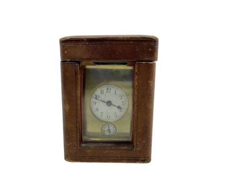 Petite French carriage clock - early 20th century timepiece movement with an alarm sounding on a bell, circular enamel dial w