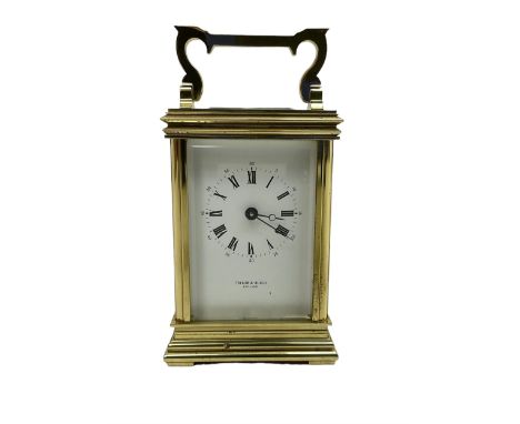 English - late 20th century 8-day carriage clock by Taylor & Bligh, in an Anglaise case with a rectangular handle, bevelled g