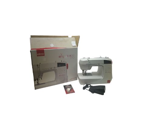 Elna sewing machine eXperience 570, with original box and instruction manual