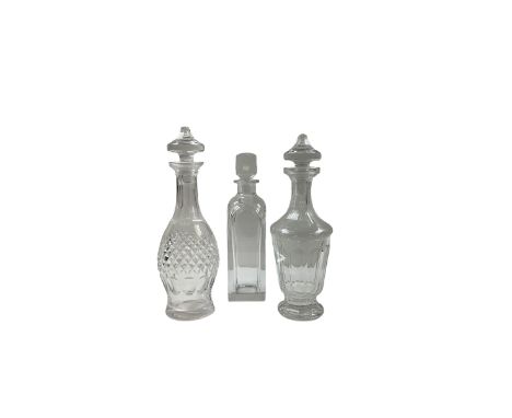 Orrefors glass decanter, singed to base, together with two Waterford cut crystal decanters, tallest H34cm