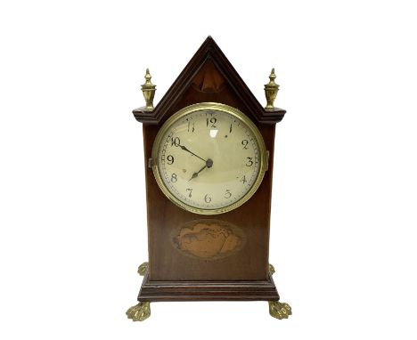 French - Edwardian 8-day mahogany inlaid mantle clock with a gable pediment and brass finials, oval inlay to the front and ra