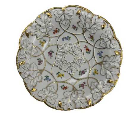 20th century Meissen leaf moulded dish, of circular form with lobed edge, decorated with gilt heightened moulded leaves and p