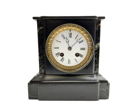 French - mid 19th century 8-day Belgium slate mantle clock in a break-front case with a flat top and varigated green marble i