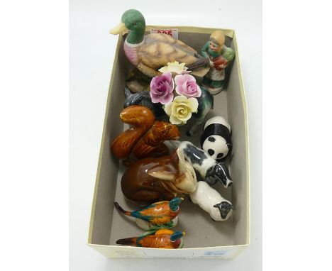 A mixed collection of items to include: Beswick Dogs, Panda Cub, Pheasants , Poole Pottery Animal Figures, Capo figure of duc