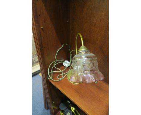 A BRASS RUBY GLASS AND FROSTED GLASS TABLE LAMP.