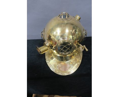 A BRASS MODEL OF A US NAVY DIVING HELMET.