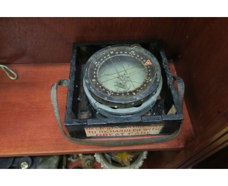 A VINTAGE LIFEBOAT COMPASS, in ebonised case.