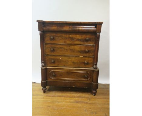 A VICTORIAN FLAME MAHOGANY SCOTCH CHEST, the rectangular break front top above a convex shaped drawer, with three deep cock b