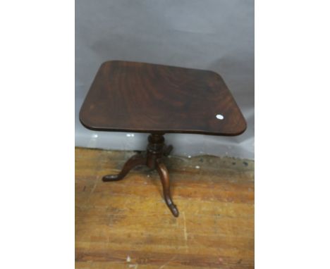 A 19th CENTURY MAHOGANY OCCASIONAL TABLE, the rectangular top raised on ring turned support with tripod base and pad feet,59c