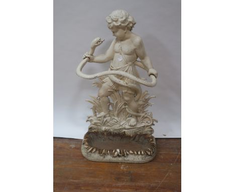 A WHITE PAINTED CAST IRON STICK STAND, in the form of a classical child holding a serpent with sunken rectangular base,87cms 