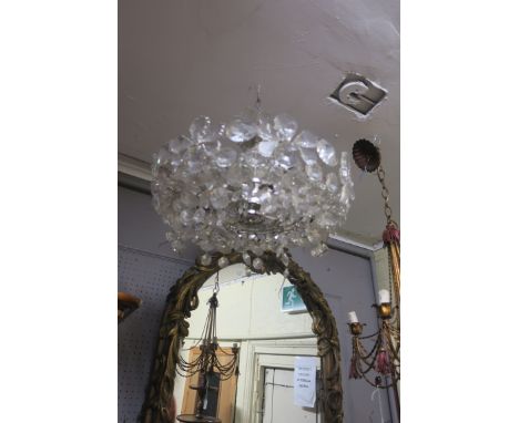 A CONTINENTAL STYLE  CUT GLASS CENTRE LIGHT, the chrome frame decorated with clustered foliates.