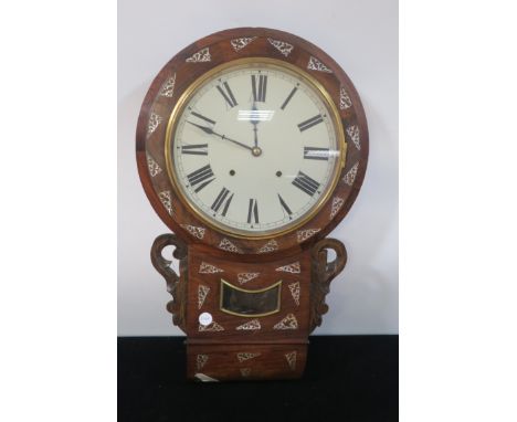 AN EARLY 20th CENTURY MAHOGANY AND MOTHER OF PEARL WALL MOUNTED CLOCK, the circular frame fitted with a white dial with black