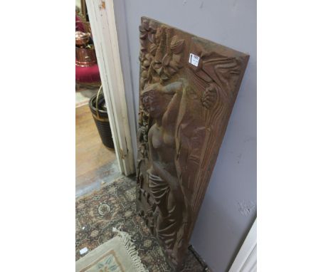 A CAST IRON PANEL, moulded in high relief with semi-clad females,114cms x 46cms.