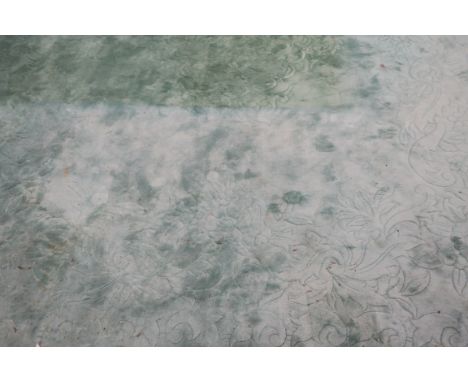 A GOOD CHINESE WOOL RUG, the plain light green ground with floral decoration 375cms x 280cms
