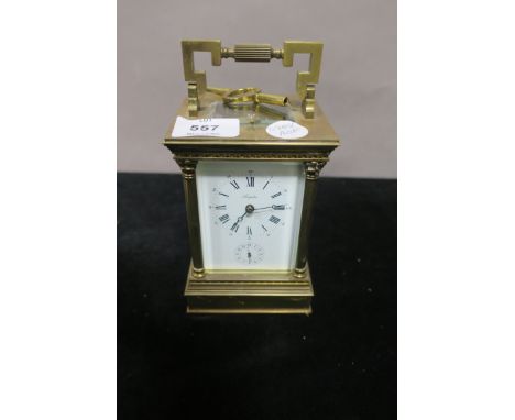 A FRENCH BRASS REPEATER CARRIAGE CLOCK.