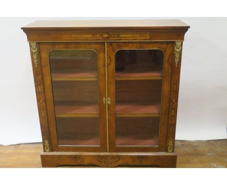 A VICTORIAN WALNUT AND MARQUETRY INLAID DISPLAY CABINET the rectangular top above a marquetry inlaid frieze with gilt brass t