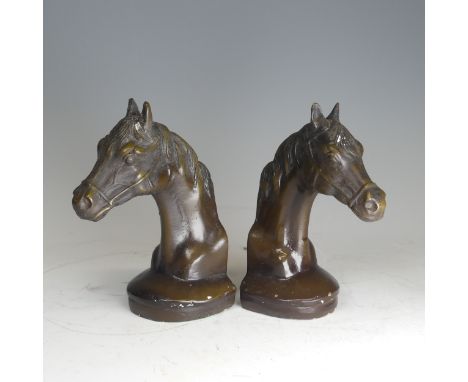A pair of French bronze Bookends, early 20th century, modelled as horse heads, signed Moreau, 16cm high (2)