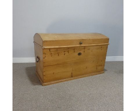 A pine domed top Trunk, with carrying handles to either side, W 100 cm x H 65 cm x D 58 cm.