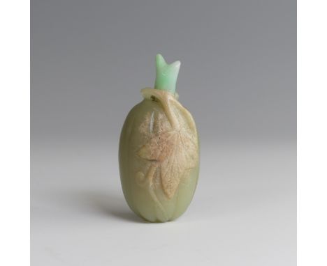 A Chinese celadon jade Snuff Bottle, finely carved in the form of a melon, with jade stopper, H 4.5cm.