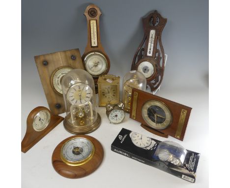 A Bentina Anniversary Clock, with glass dome, together with a quantity of other mantle clocks, aneroid barometers/thermometer