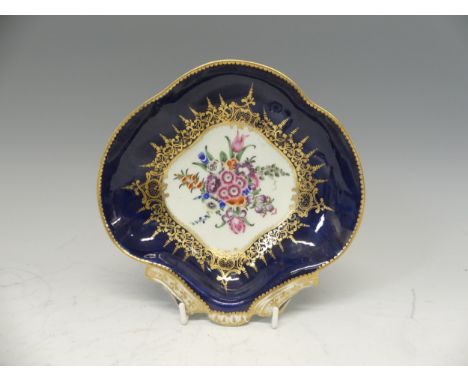 A first period Worcester Hors D'Ouevres Dish,&nbsp;underglaze blue crescent moon, powder blue border and floral decoration to