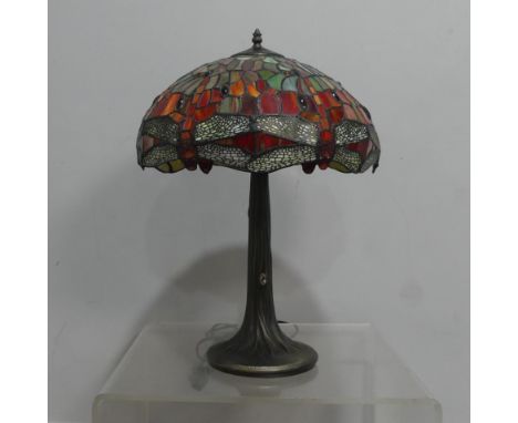 An Art Deco style Tiffany &amp; Co inspired stained glass Lamp, the shade decorated with dragonflies, H 60 cm.