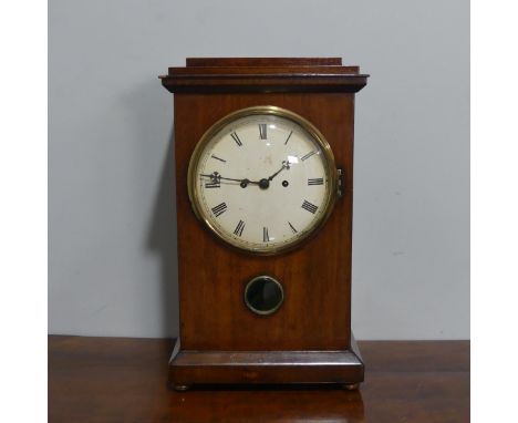 A 20th century mahogany cased mantel Clock, the white dial with roman numerals encased by convex glass, above pendulum apertu