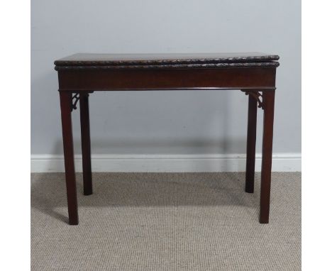 A George III Chippendale mahogany carved Card Table, raised on four chamfered supports, W 91.5 cm x H 72.5 cm x D 46 cm.