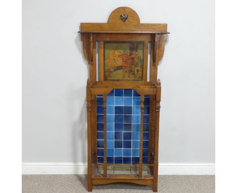 A rare Shapland and Petter of Barnstaple oak Arts and Crafts Hall Stand, the arched top inset with heart shaped Ruskin and an