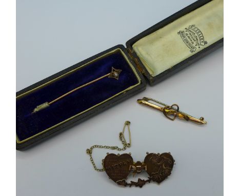 A Victorian 9ct gold mizpah brooch, one other 9ct gold brooch and a 9ct gold and seed pearl stick pin, total weight 5.4g