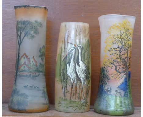 Three French glass vases;- one decorated with two water birds in enamel, signed JEM, and one signed Laignelet, height of tall