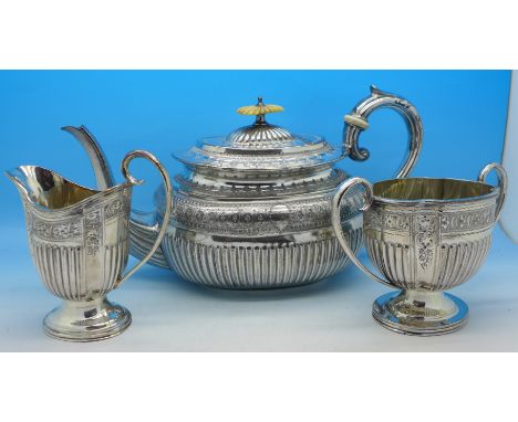 A matched three piece silver plated tea service