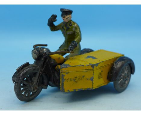 A 1930's Moultoy model AA patrol motorcycle with sidecar