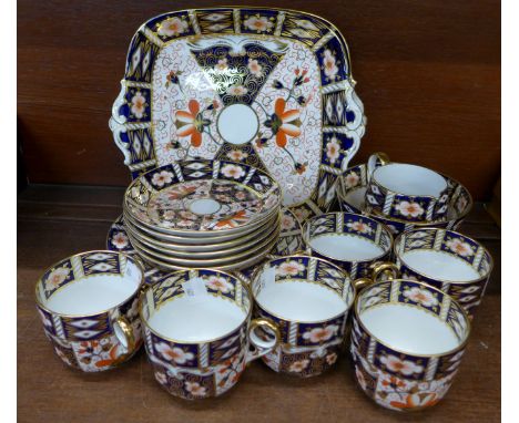 A Royal Crown Derby 2451 pattern set of six cups, saucers and side plates, two sandwich plates, cream and sugar