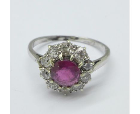 An 18ct gold, ruby and diamond cluster ring, 3.4g, O