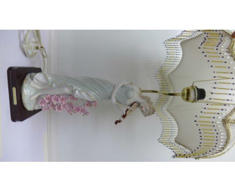 An Elegant Collection figural table lamp