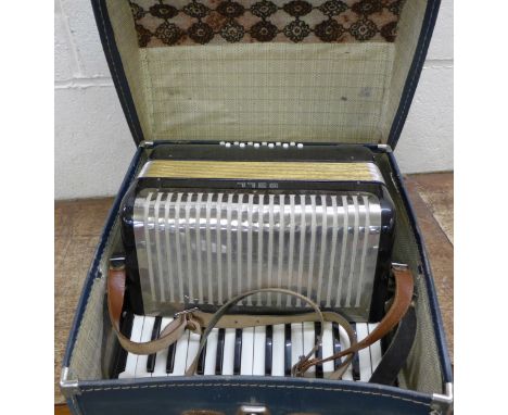 A Bell piano accordion, cased