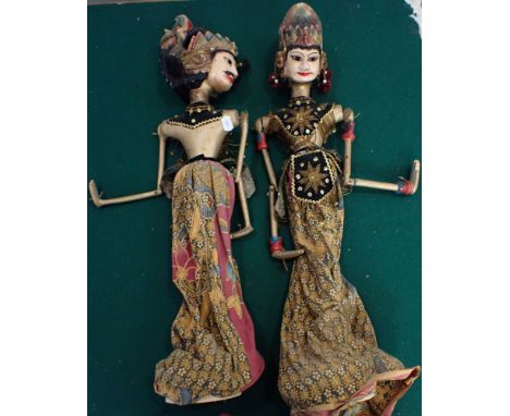 TWO VINTAGE INDONESIAN STICK PUPPETS together with a collection of asian shoes, hats etc