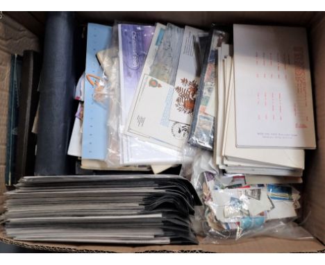 A QUANTITY OF FIRST DAY COVERS together with some stamps albums containing most British stamps
